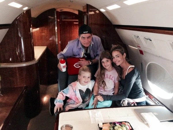 Charlie with his ex-wife Denise and their daughter in the jet plane
